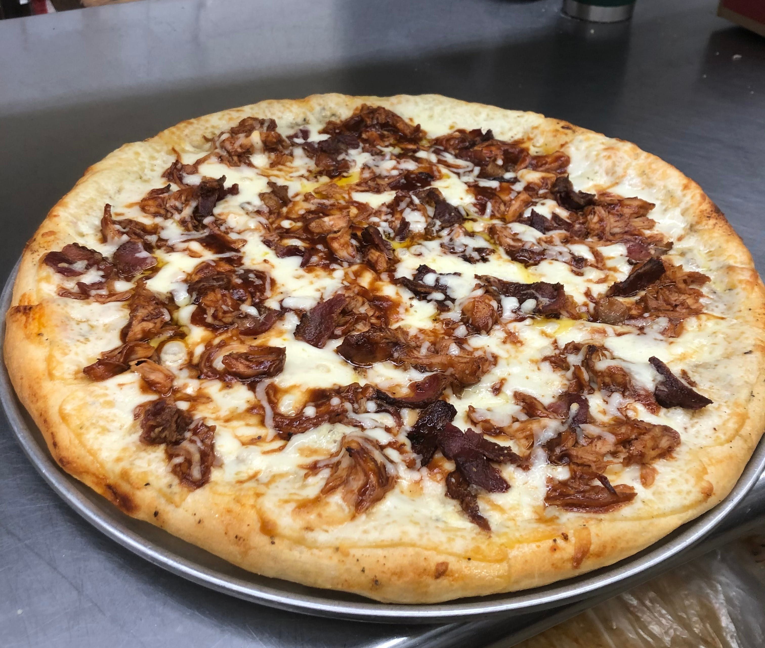 Chicken & Pig Pizza.